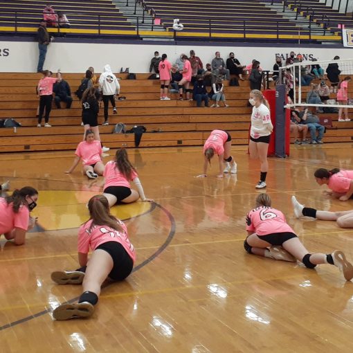 Pictured: Elmira Falcons (varsity) warming up for game taken by: Kelsey Hemple